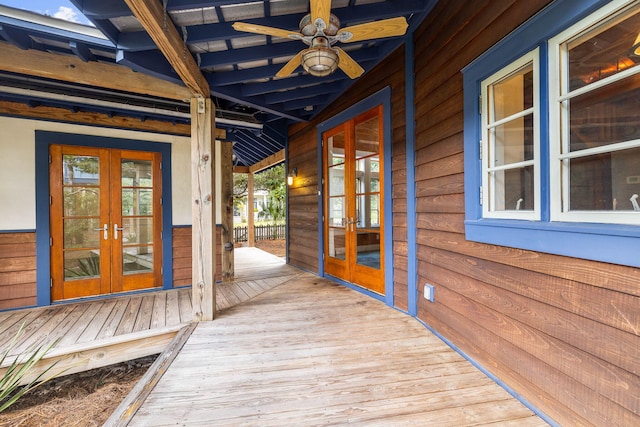 deck featuring ceiling fan and french doors