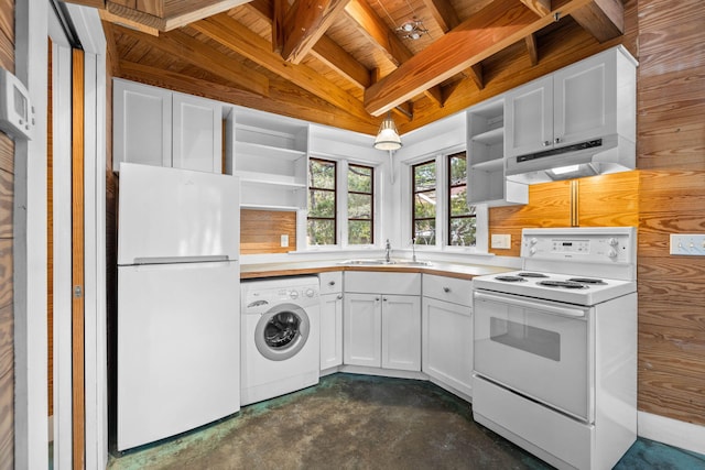 kitchen with white cabinets, hanging light fixtures, white appliances, washer / dryer, and vaulted ceiling with beams