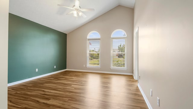 unfurnished room featuring high vaulted ceiling, wood-type flooring, and ceiling fan