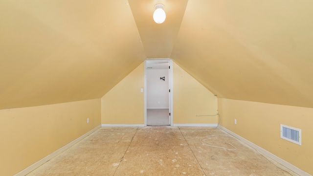 additional living space with lofted ceiling