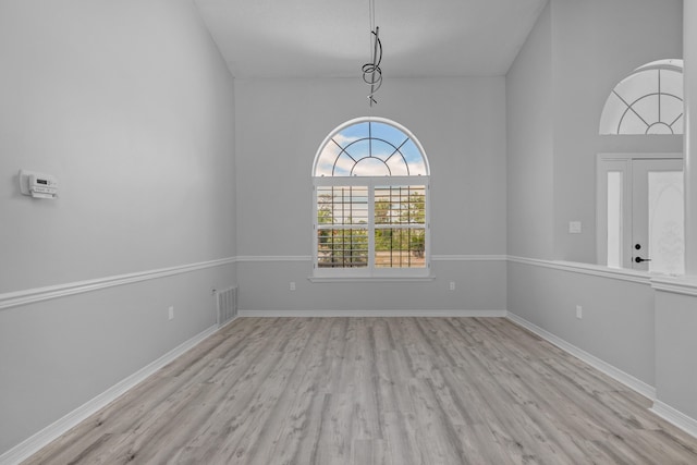 unfurnished room featuring light hardwood / wood-style flooring