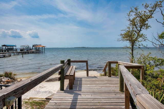 view of dock with a water view