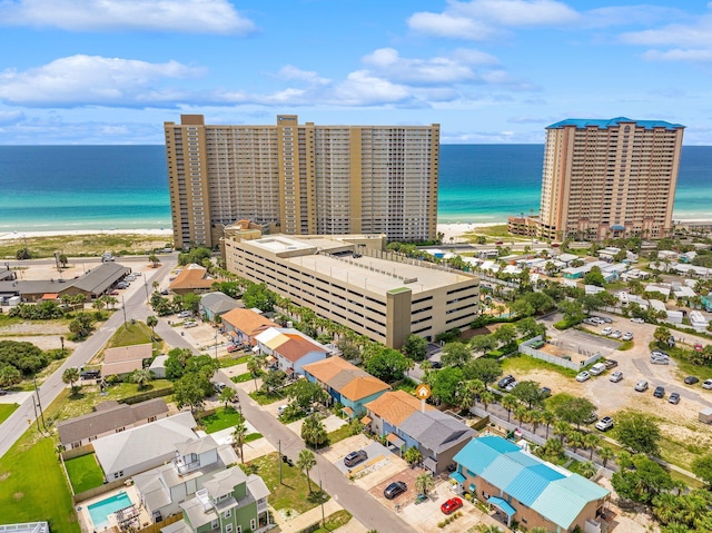 bird's eye view with a water view and a view of the beach