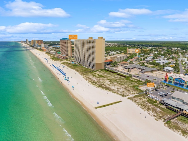 bird's eye view featuring a beach view and a water view