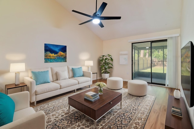 living room with high vaulted ceiling, ceiling fan, and wood-type flooring