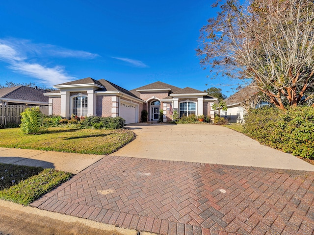 view of front of property featuring a garage