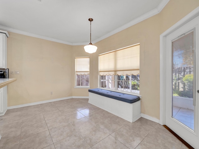 unfurnished dining area featuring crown molding and light tile patterned floors