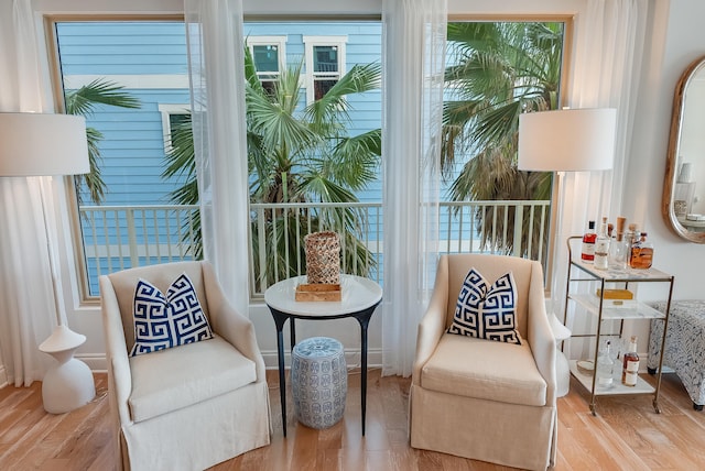 sitting room featuring light hardwood / wood-style floors