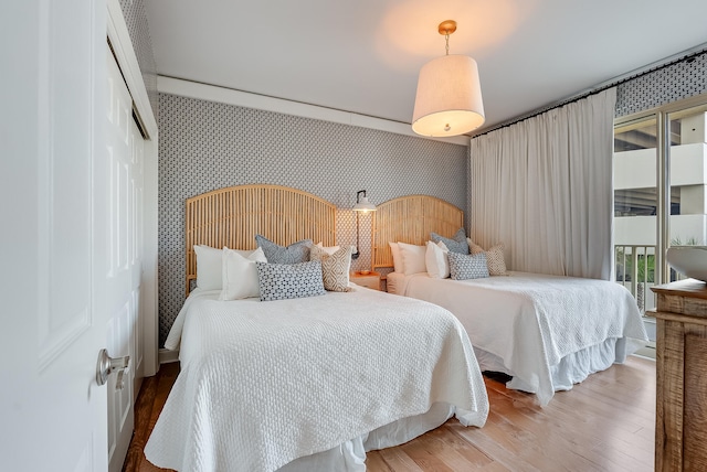 bedroom featuring a closet and hardwood / wood-style floors