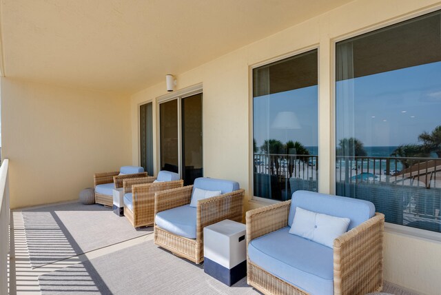 view of patio featuring a balcony