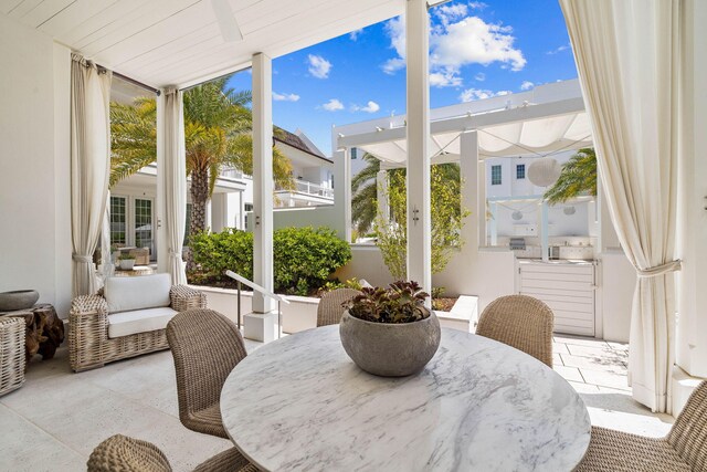 sunroom featuring a wealth of natural light