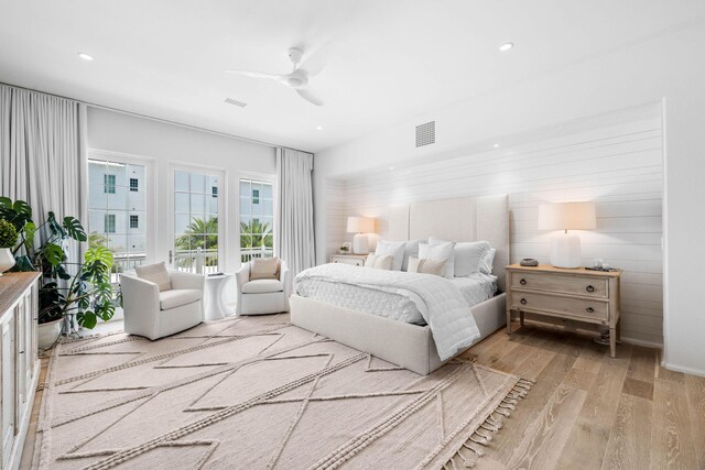 bedroom featuring light hardwood / wood-style flooring and ceiling fan