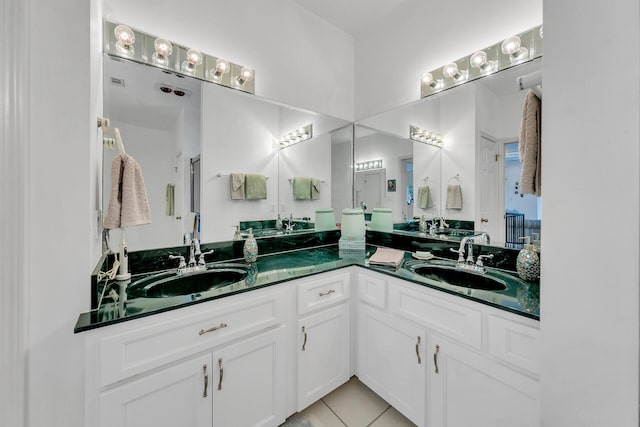 664 Woodland Bayou Dr, Santa Rosa Beach, FL 32459 - full bathroom with tile patterned floors, double vanity, and a sink