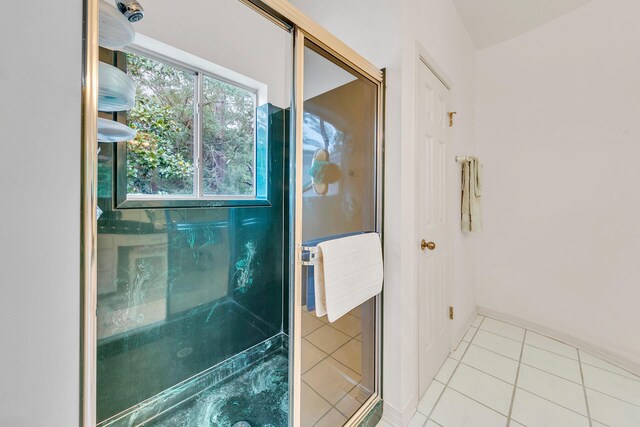 bathroom featuring a shower and tile patterned floors