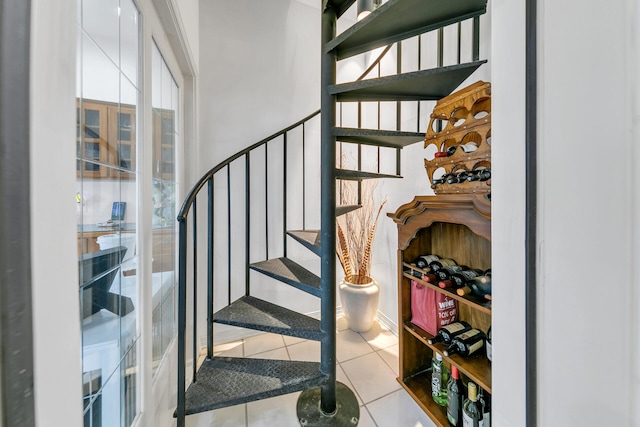 664 Woodland Bayou Dr, Santa Rosa Beach, FL 32459 - stairway with tile patterned floors