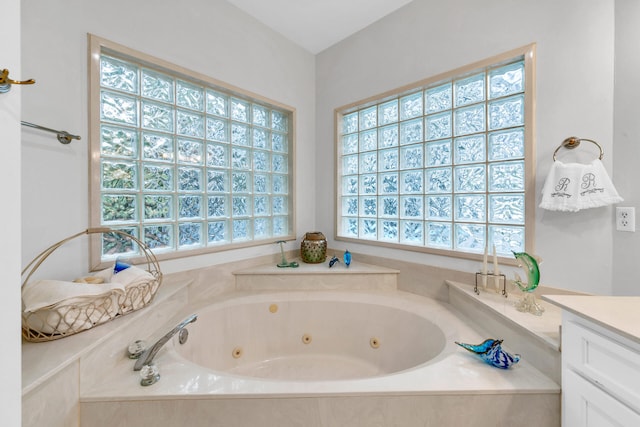 664 Woodland Bayou Dr, Santa Rosa Beach, FL 32459 - bathroom featuring a whirlpool tub and vanity