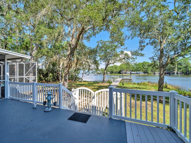 664 Woodland Bayou Dr, Santa Rosa Beach, FL 32459 - wooden terrace featuring a yard and a water view