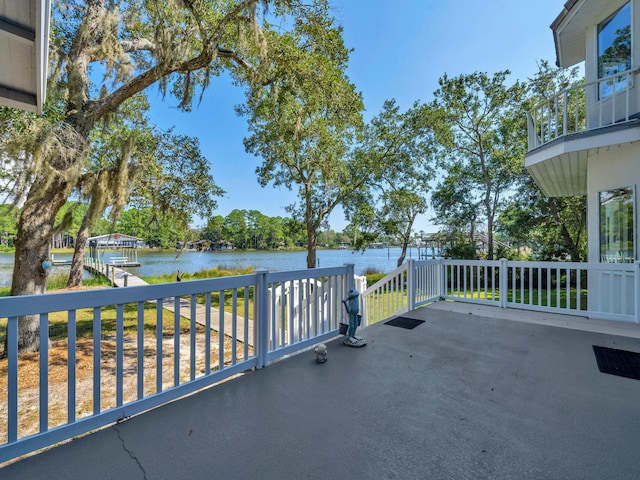 view of patio featuring a water view