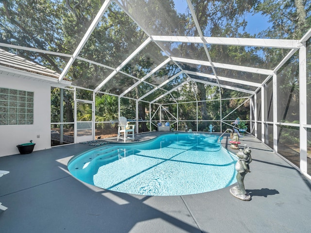 664 Woodland Bayou Dr, Santa Rosa Beach, FL 32459 - pool featuring a patio area and glass enclosure