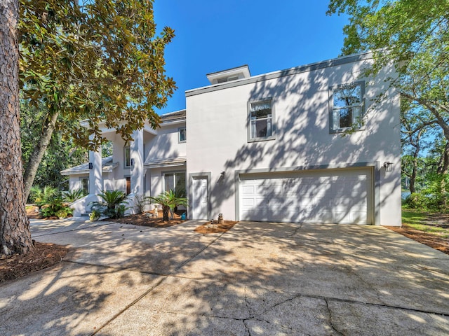 view of front of home with a garage