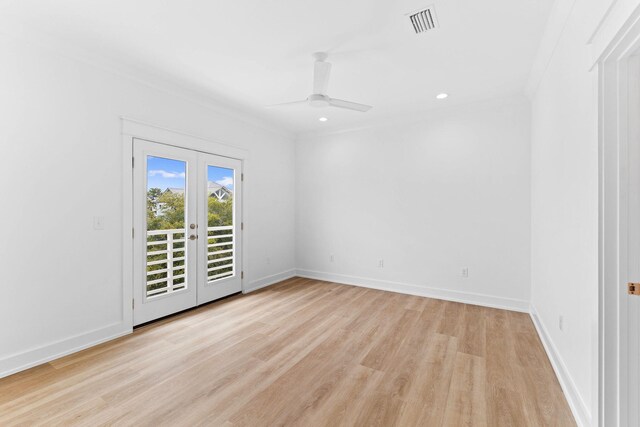 unfurnished room featuring crown molding, ceiling fan, light wood-type flooring, and french doors