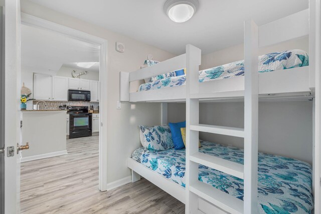 bedroom featuring light hardwood / wood-style flooring