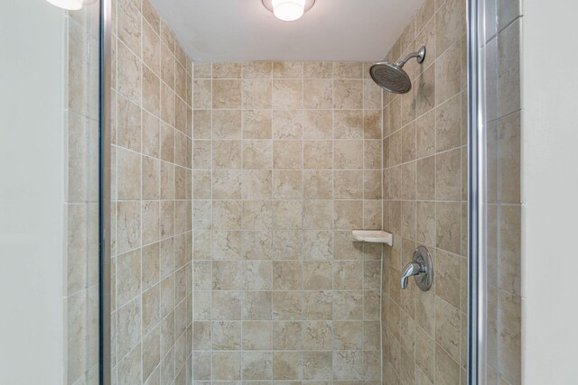 bathroom with an enclosed shower