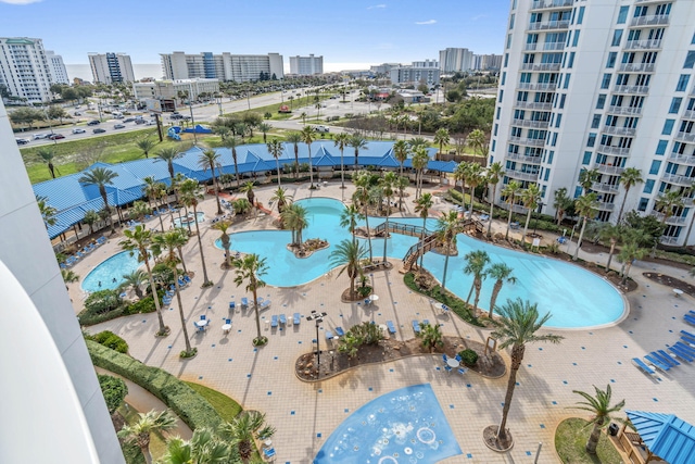 view of swimming pool featuring a patio area