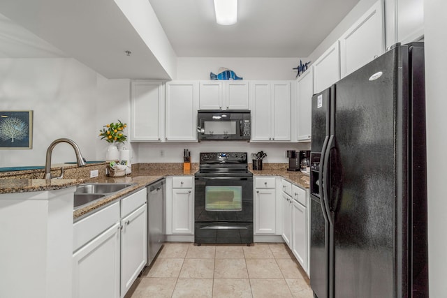 kitchen featuring dark stone counters, black appliances, kitchen peninsula, sink, and white cabinets