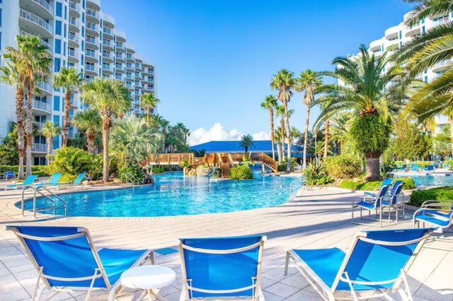 view of pool featuring a patio area