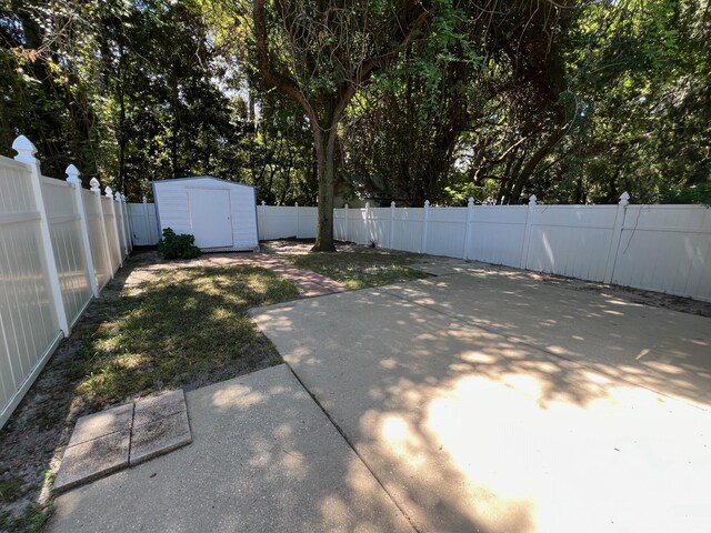 view of patio / terrace with a storage shed