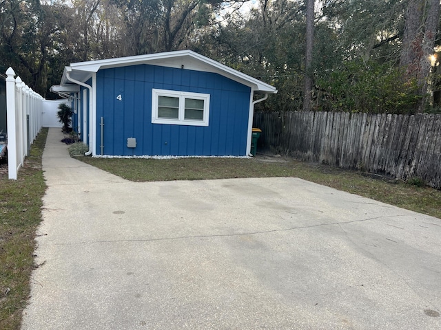 view of outdoor structure featuring a fenced backyard