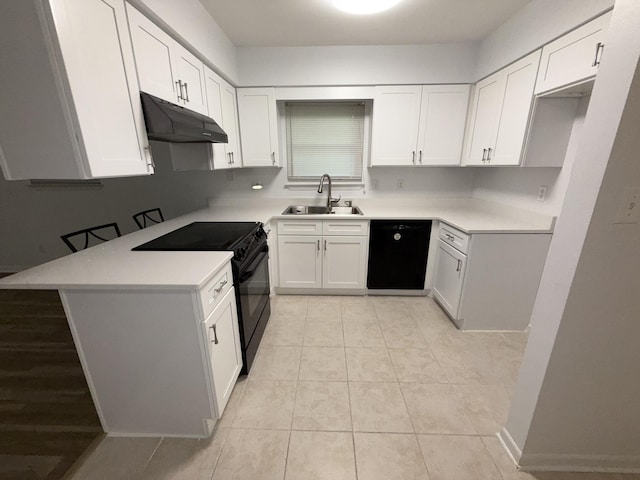 4 3rd Ave, Shalimar, FL 32579 - kitchen with under cabinet range hood, a sink, black appliances, light countertops, and white cabinets