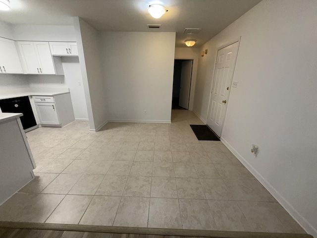 4 3rd Ave, Shalimar, FL 32579 - kitchen with baseboards, visible vents, light tile patterned flooring, white cabinetry, and light countertops