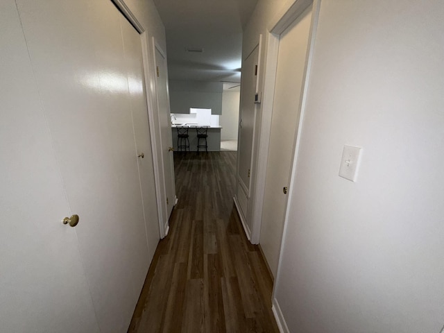 4 3rd Ave, Shalimar, FL 32579 - hallway with baseboards and wood finished floors
