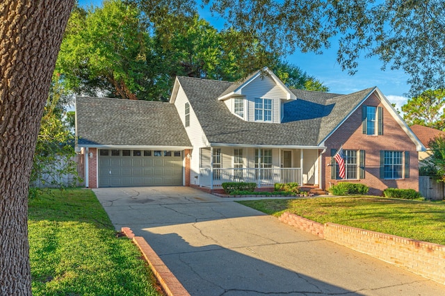 cape cod-style house with a garage, a front lawn, and a porch