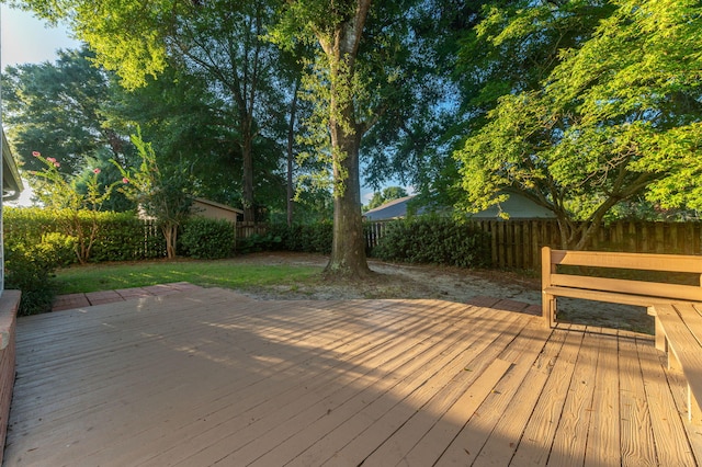 deck featuring a fenced backyard