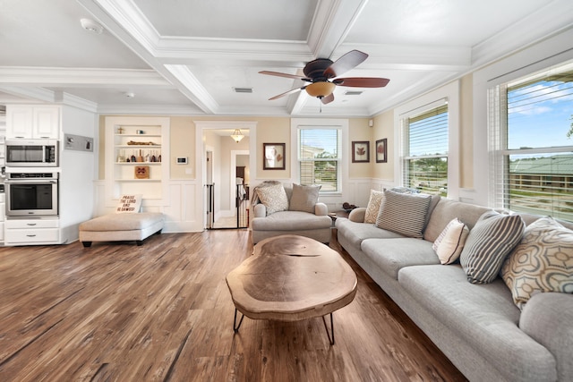 living room with ceiling fan, dark hardwood / wood-style floors, crown molding, and a healthy amount of sunlight