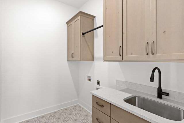 laundry room with sink, washer hookup, cabinets, hookup for an electric dryer, and light tile patterned floors