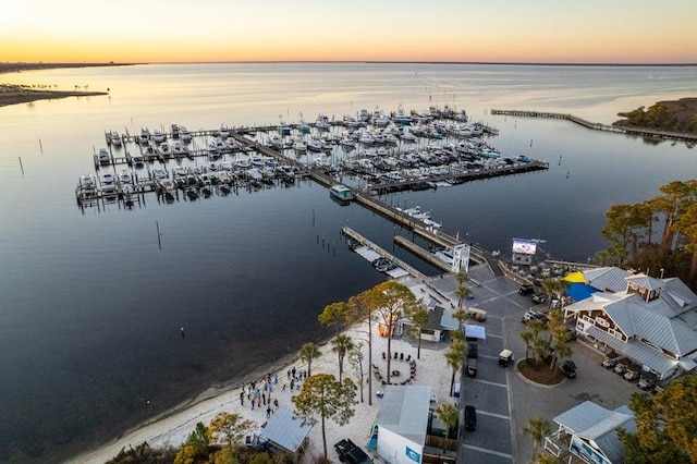 aerial view at dusk with a water view