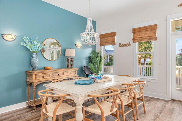 dining area with light hardwood / wood-style flooring