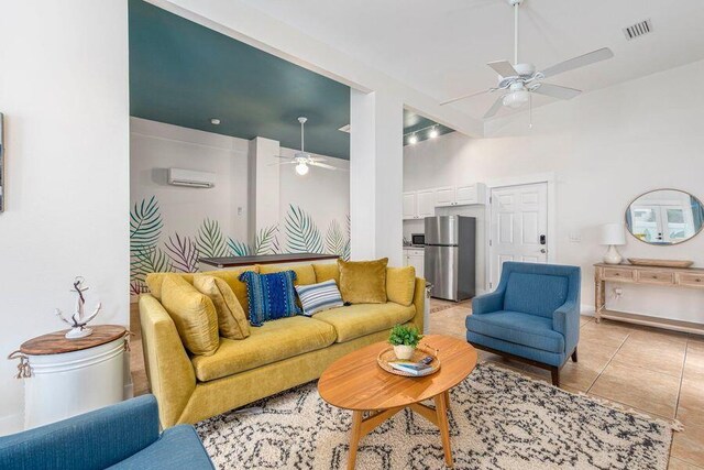 tiled living room featuring high vaulted ceiling, ceiling fan, and a wall mounted air conditioner