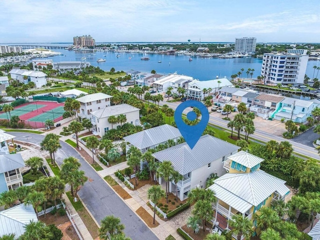 birds eye view of property featuring a water view