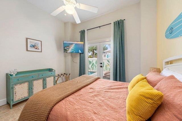 bedroom featuring french doors, light tile patterned floors, access to exterior, and ceiling fan