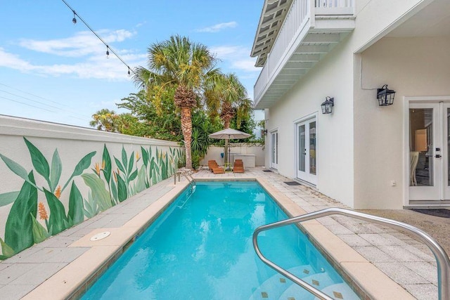 view of pool featuring a patio