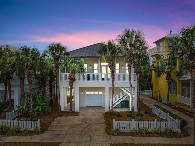 coastal inspired home featuring a garage