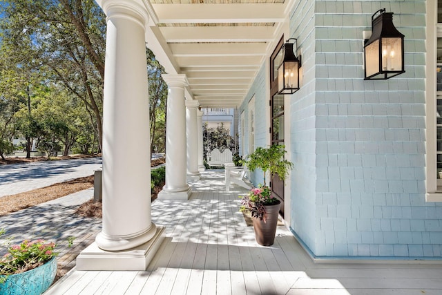 wooden terrace featuring a porch