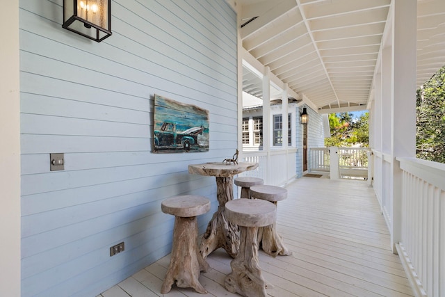 wooden deck with a porch