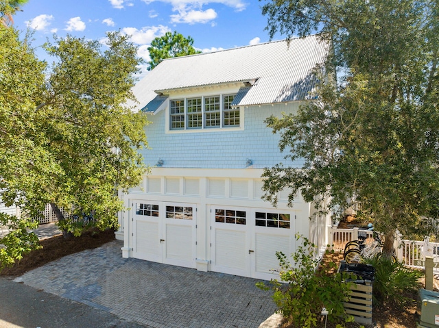 view of front of property with a garage