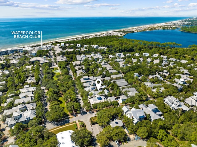 aerial view with a water view and a view of the beach